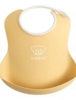 Babero suave amarillo pastel BabyBjÃ¶rn